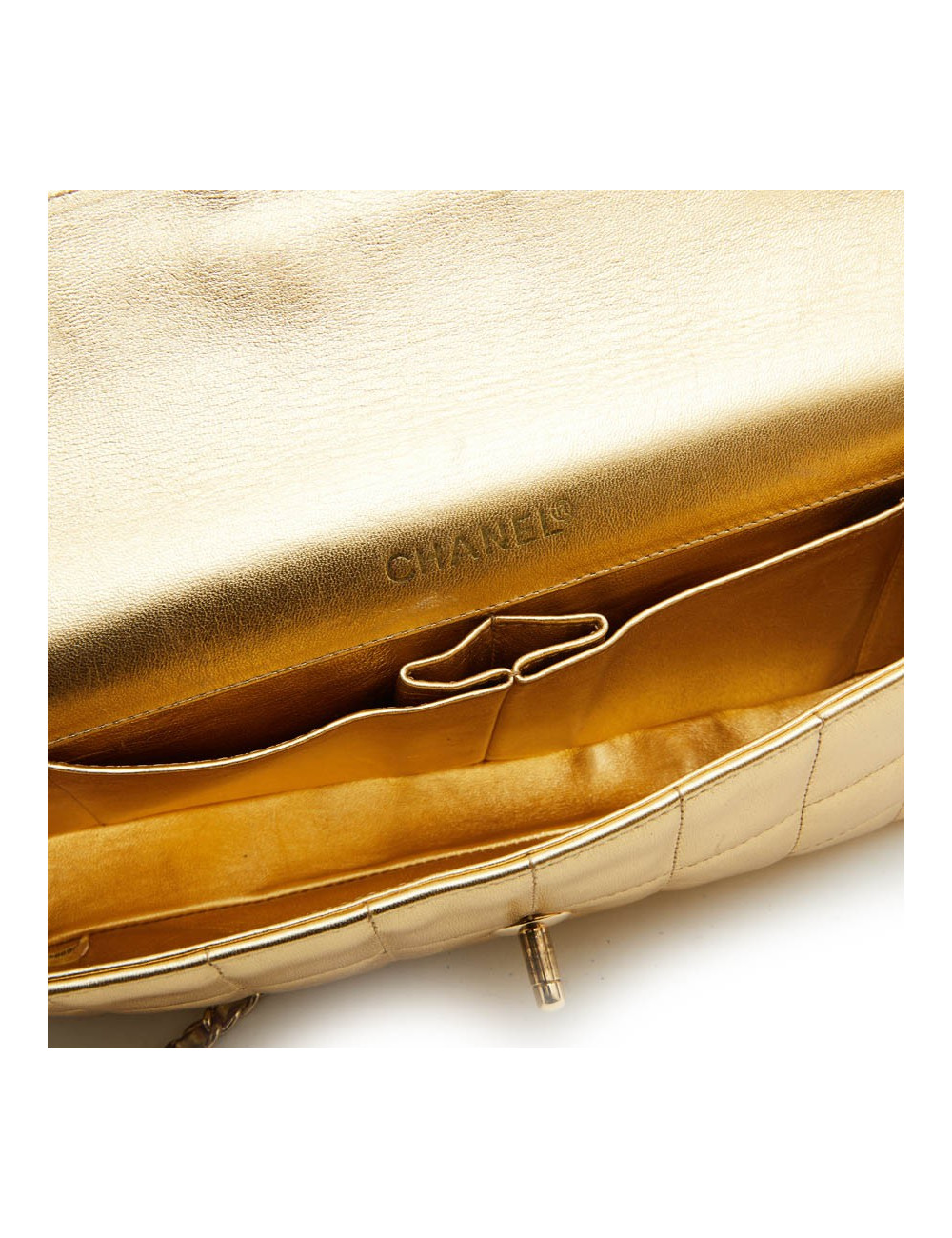 Sac baguette CHANEL cuir matelassé doré