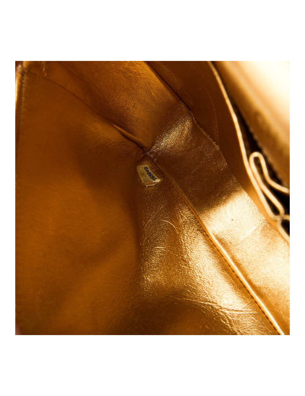 Sac baguette CHANEL cuir matelassé doré