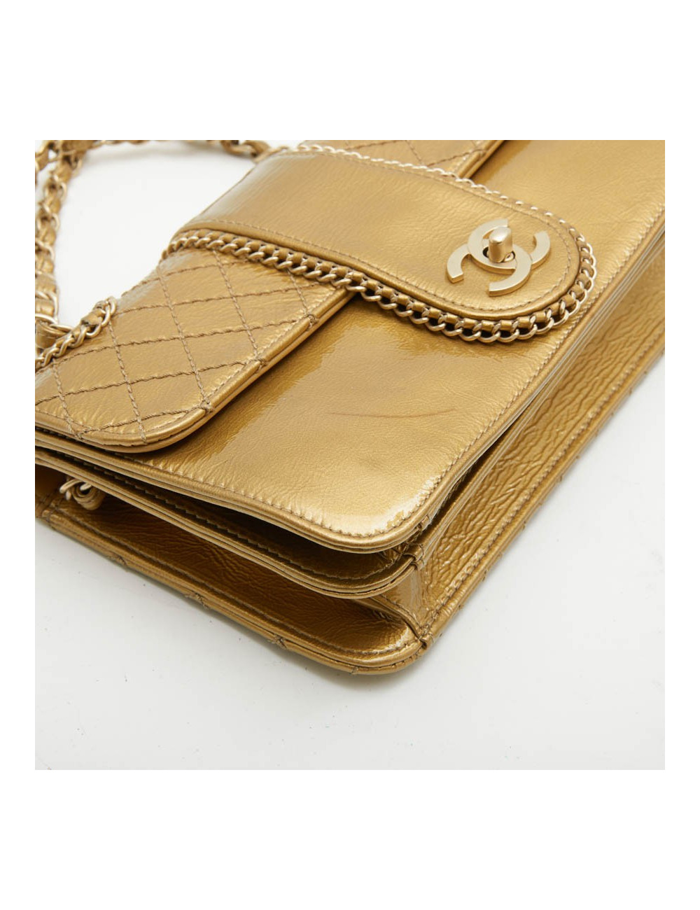 CHANEL bag in aged gold color patent leather