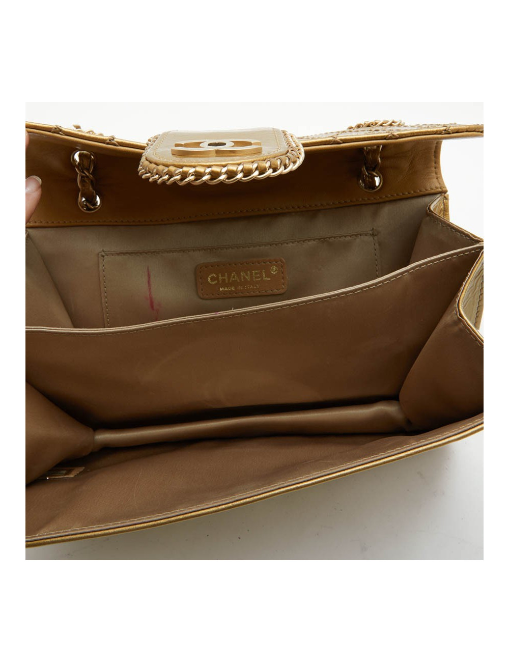CHANEL bag in aged gold color patent leather
