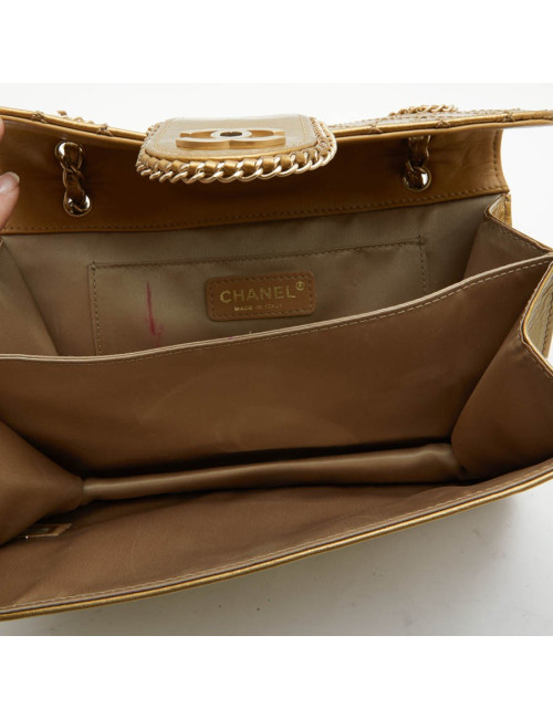 CHANEL bag in aged gold color patent leather