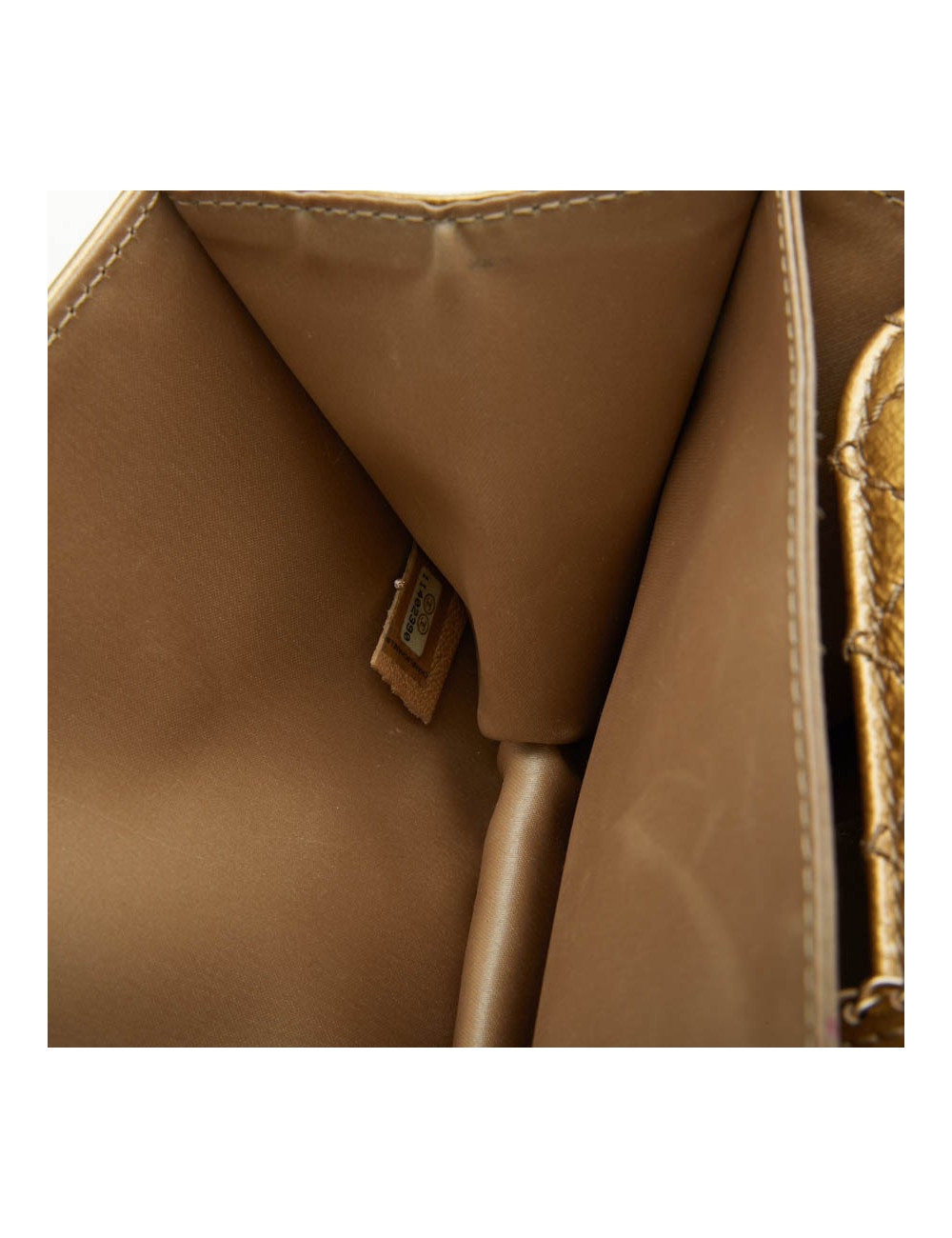 CHANEL bag in aged gold color patent leather