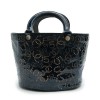 CHANEL bag in perforated navy blue patent leather