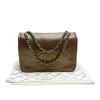 CHANEL flap bag in coppered golden leather