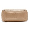  CHANEL 'Cocoon' bag in gold quilted leather