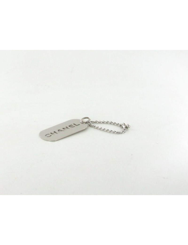 Porte clés CHANEL en métal argenté