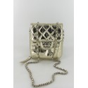 Small gold quilted leather CHANEL bag