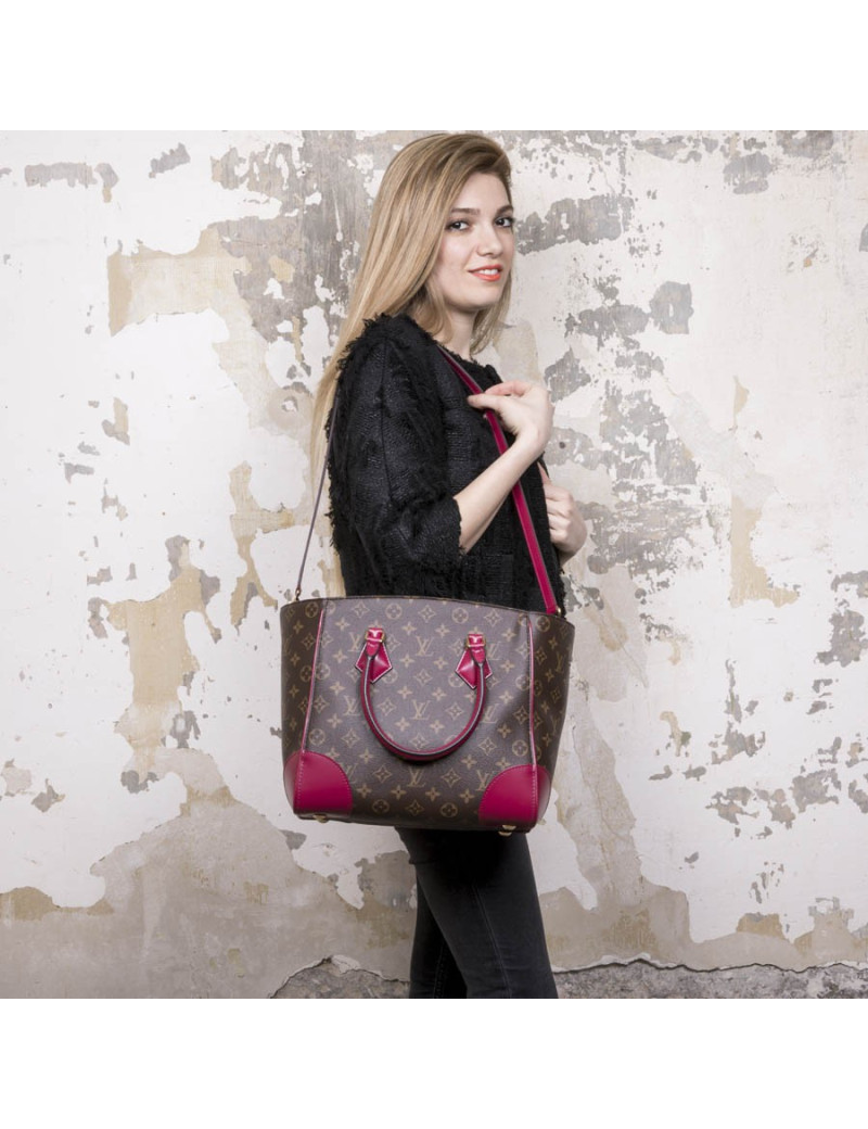 Sac "Phenix" LOUIS VUITTON toile monogram et cuir fuchsia