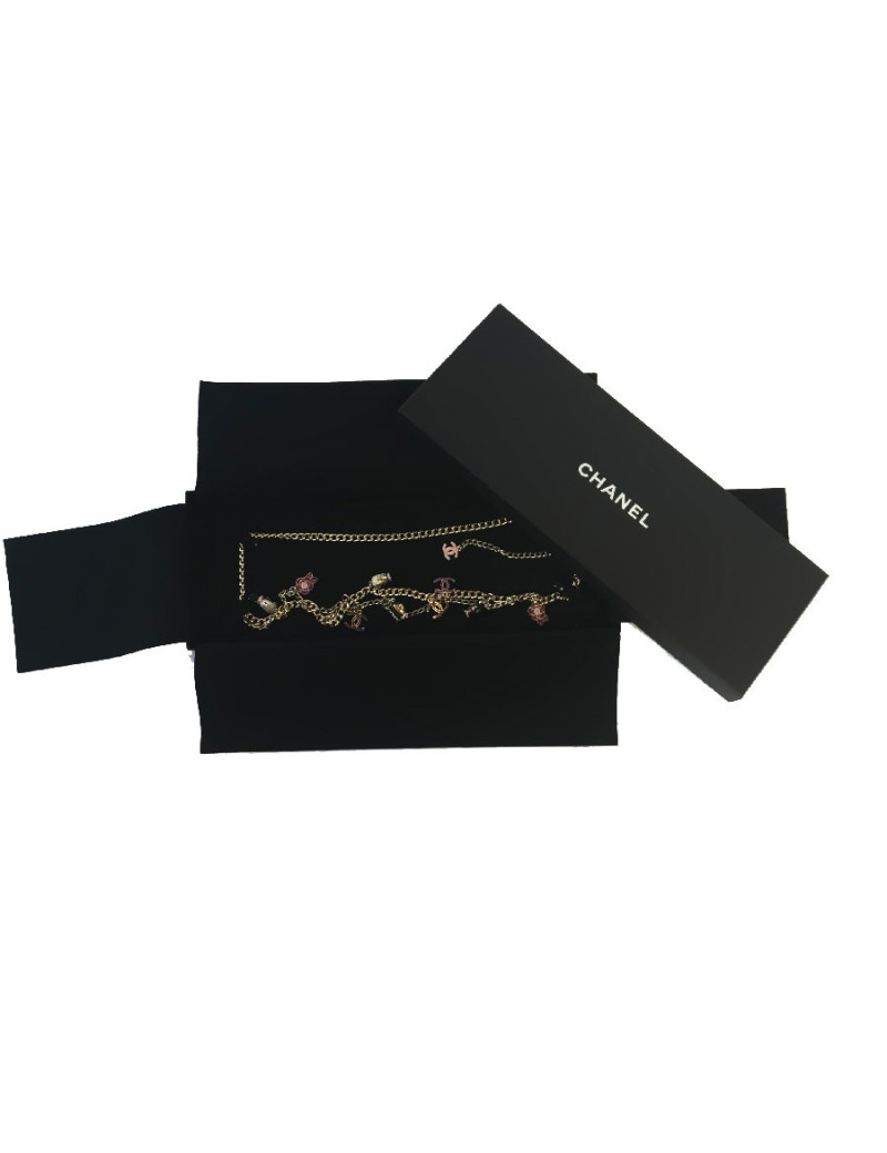 CHANEL "Paris-Shanghai"long necklace belt in gilt metal and charms