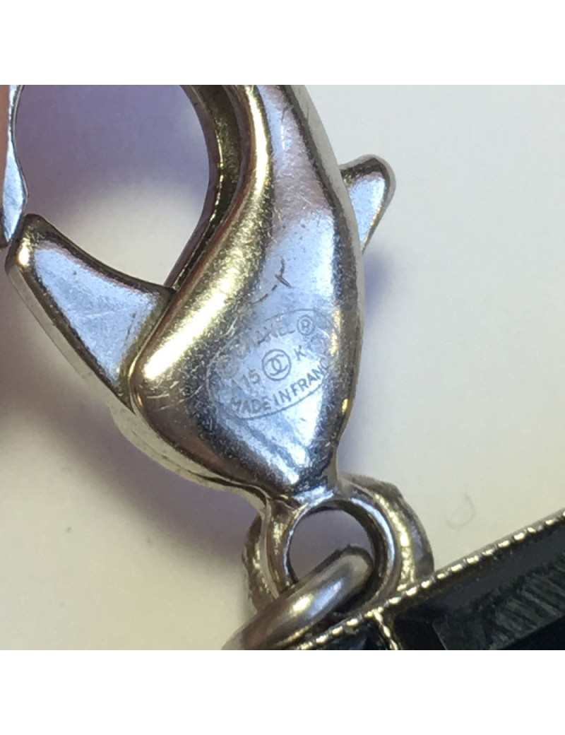 CHANEL Couture articulated cuff bracelet in matte silver metal set with Swarovski rhinestones