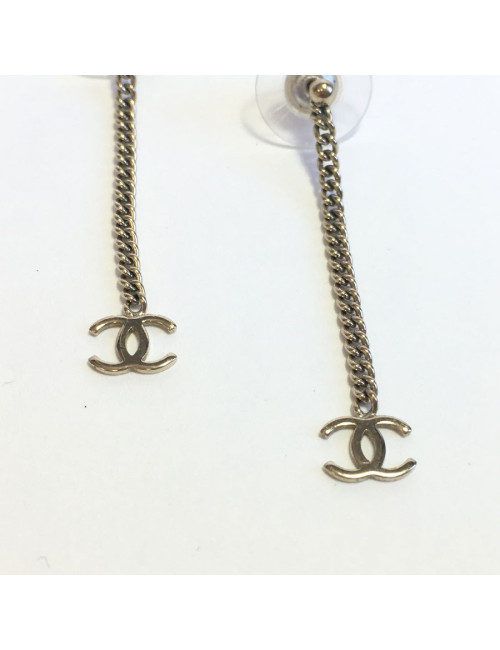 Boucles d'oreille clous CHANEL Pendantes en métal doré