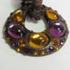  YSL YVES SAINT LAURENT Vintage clip-on earrings in bronze metal, rhinestones and resin