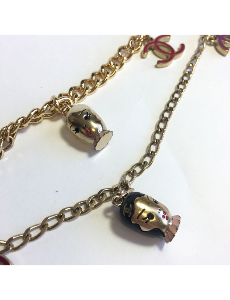 CHANEL "Paris-Shanghai"long necklace belt in gilt metal and charms