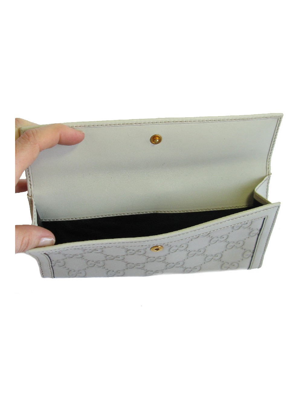 Portefeuille GUCCI cuir embossé GG beige