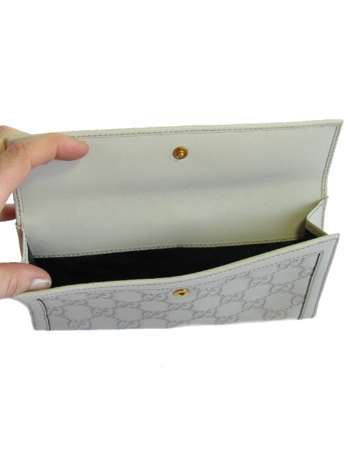 Portefeuille GUCCI cuir embossé GG beige