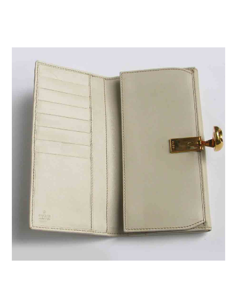 Portefeuille GUCCI cuir embossé GG beige