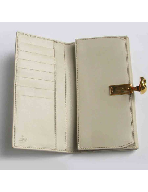 Portefeuille GUCCI cuir embossé GG beige