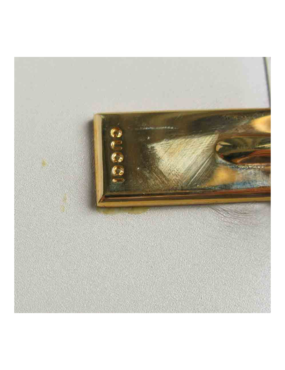 Portefeuille GUCCI cuir embossé GG beige