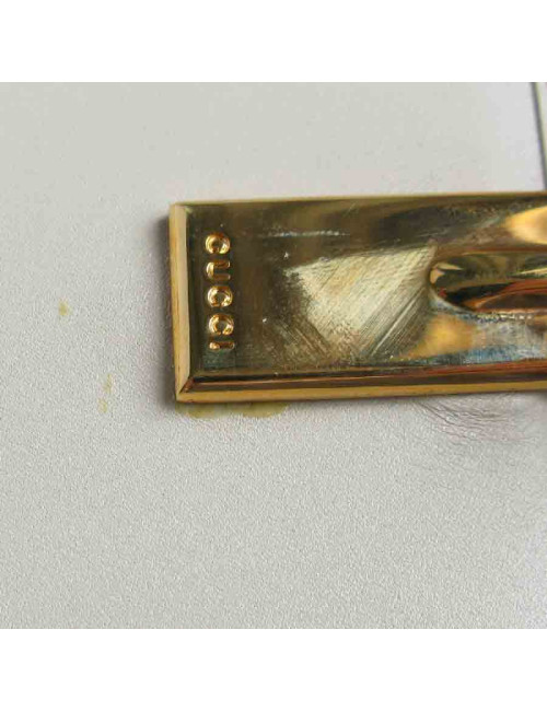 Portefeuille GUCCI cuir embossé GG beige