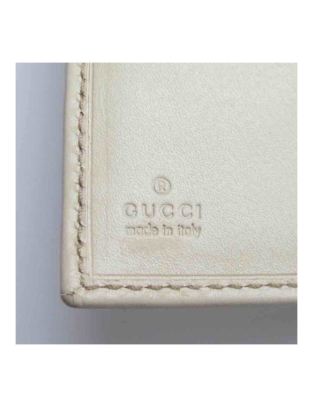 Portefeuille GUCCI cuir embossé GG beige