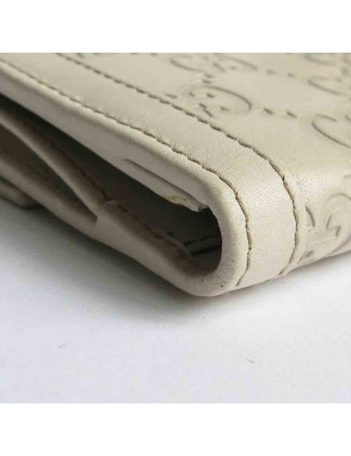 Portefeuille GUCCI cuir embossé GG beige