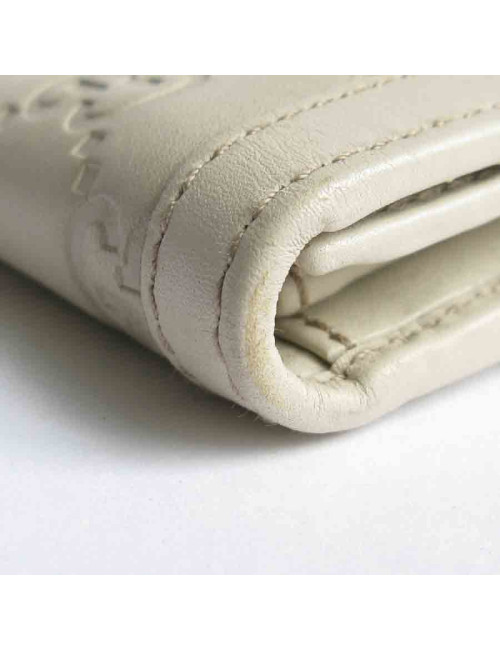 Portefeuille GUCCI cuir embossé GG beige
