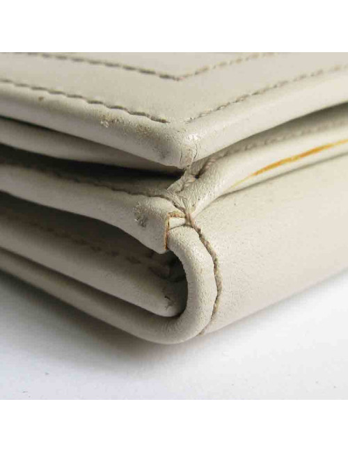 Portefeuille GUCCI cuir embossé GG beige