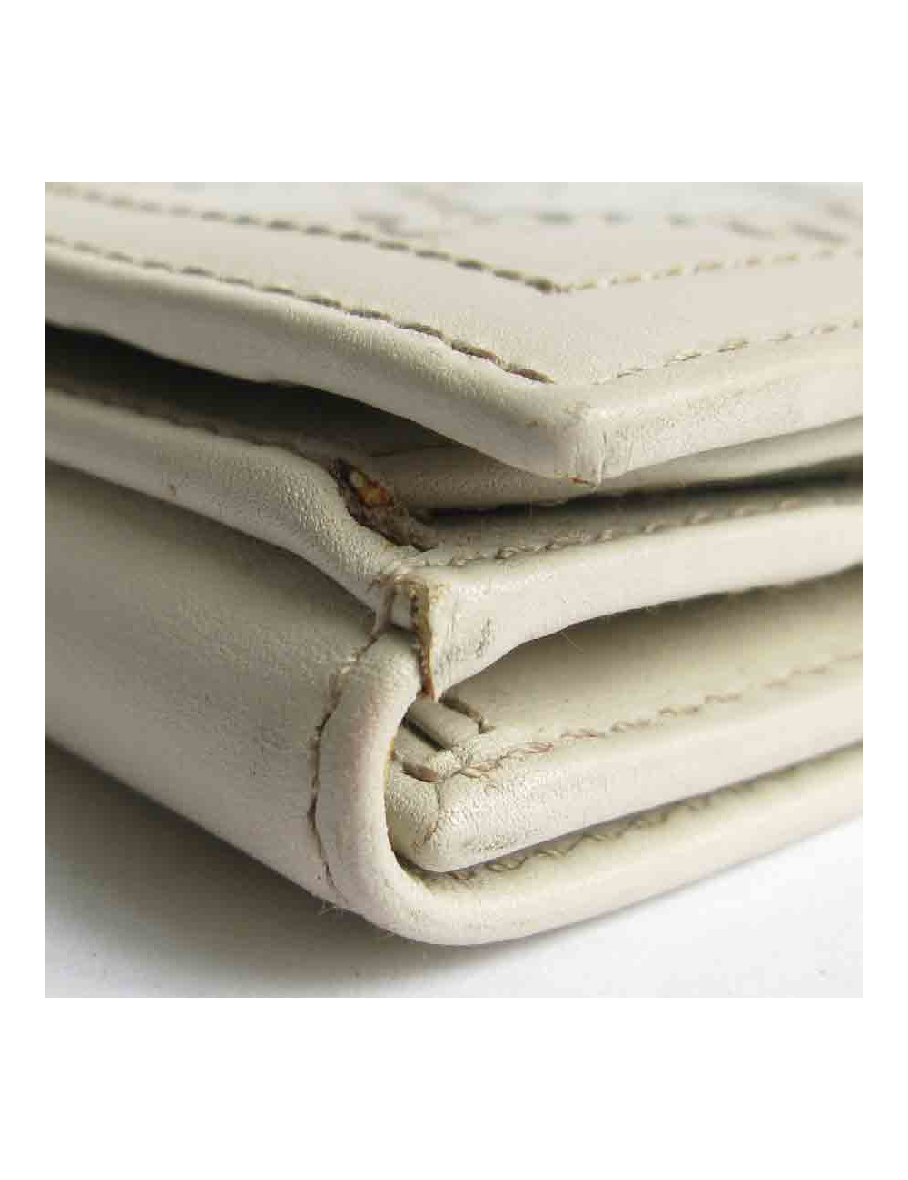 Portefeuille GUCCI cuir embossé GG beige