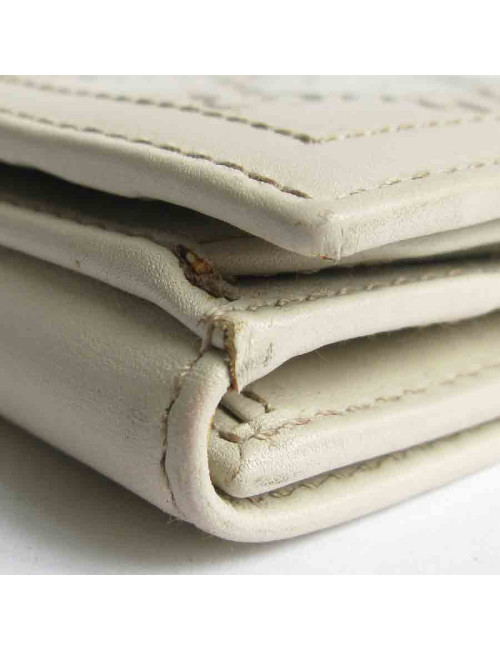 Portefeuille GUCCI cuir embossé GG beige