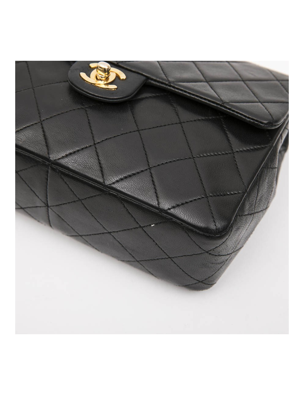 CHANEL vintage mini bag in black quilted lambskin leather