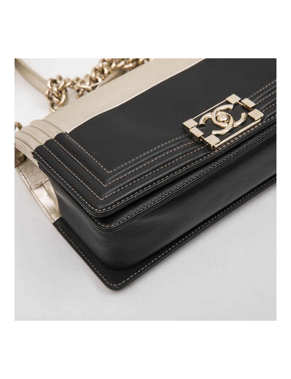 CHANEL Boy bag in black and pale gold smooth lamb leather