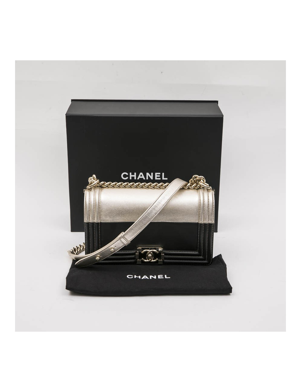 CHANEL Boy bag in black and pale gold smooth lamb leather