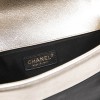 CHANEL Boy bag in black and pale gold smooth lamb leather