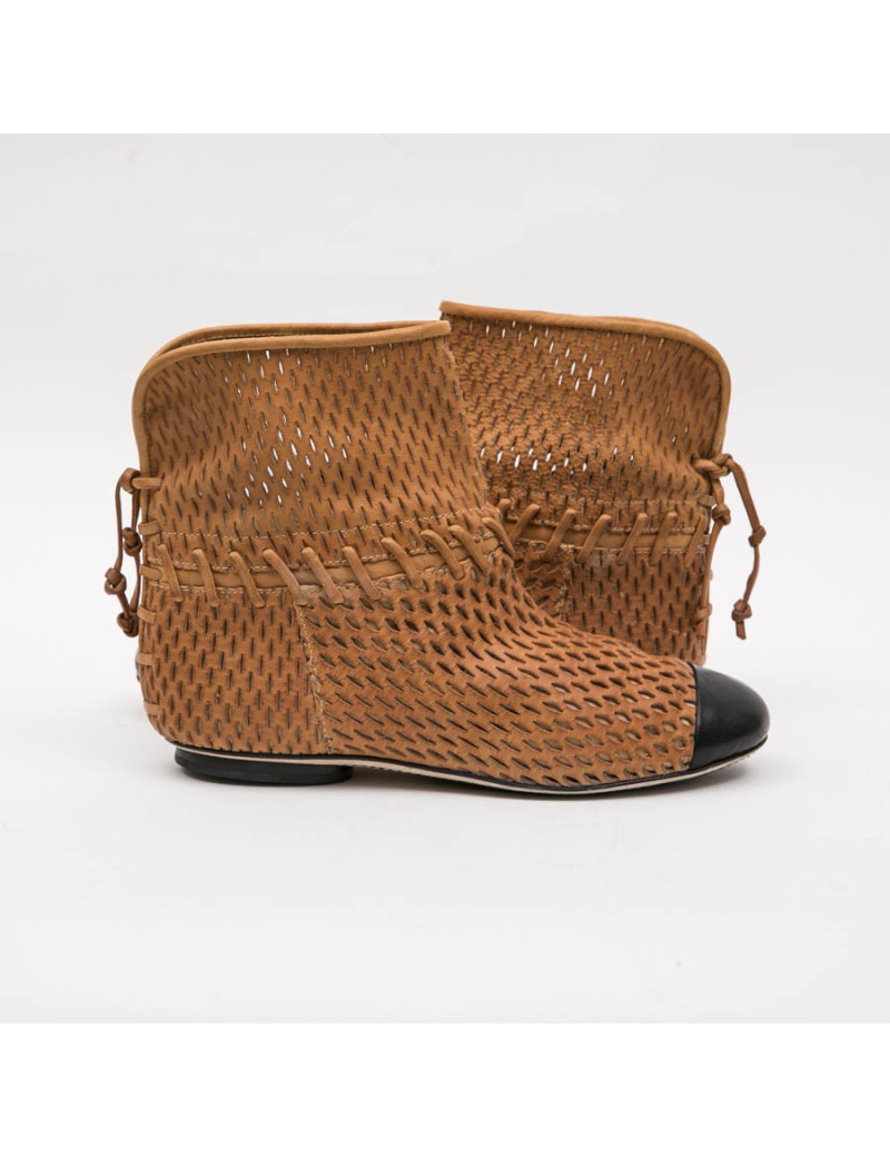 CHANEL Boots in Gold perforated leather and black lamskin leather size 37