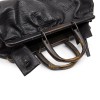 GUCCI vintage bag in a black cowhide leather and ribbed wood