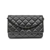CHANEL 'Wallet on chain' bag in black quilted smooth leather