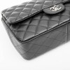 CHANEL Jumbo double flap bag in black smooth quilted lamb leather