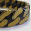 Bracelet CHANEL motif chaine dorée et noire