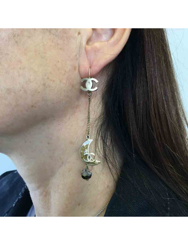 Boucles d'oreille clous CHANEL pendantes étoile et lune en métal doré
