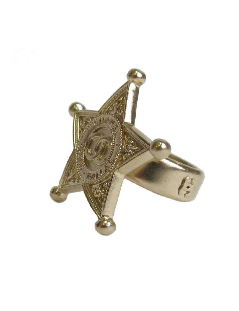 Bague CHANEL T52 Etoile de Shérif en métal doré