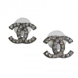 CHANEL "CC" stud earrings in ruthénium and rhinestones