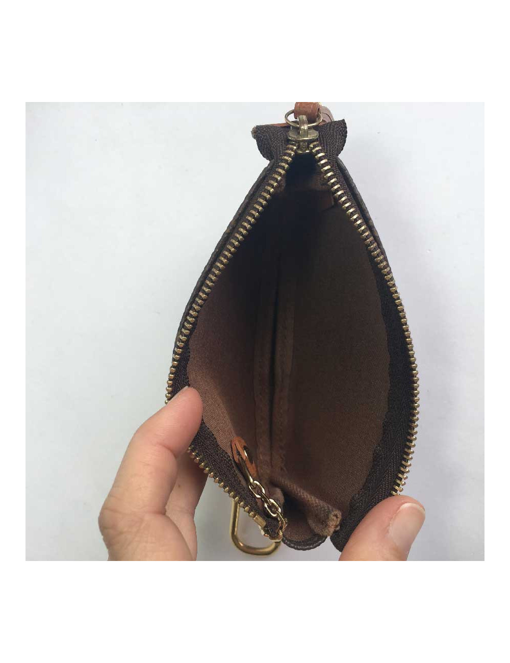 Mini pochette LOUIS VUITTON "Wardrobe Trunks" en toile monogram marron