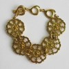 Bracelet YSL YVES SAINT LAURENT Vintage en métal doré