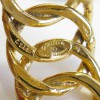 CHANEL vintage cuff bracelet in gilt metal braided chain