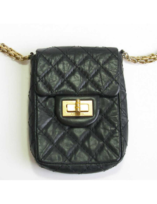 CHANEL Clutch in aged black quilted leather