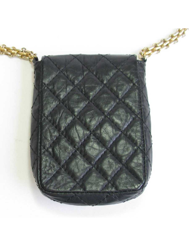 CHANEL Clutch in aged black quilted leather