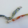 E.S Collier-bracelet "Bombe" HERMES lien en soie multicolore