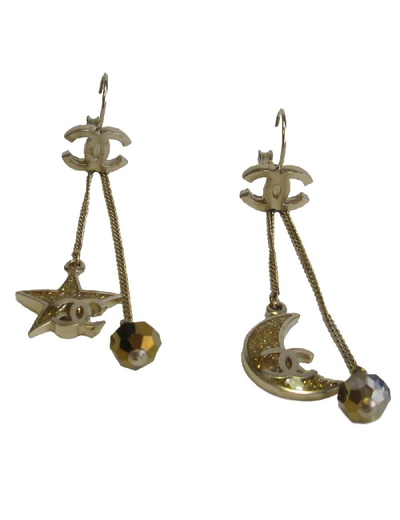 Boucles d'oreille clous CHANEL pendantes étoile et lune en métal doré