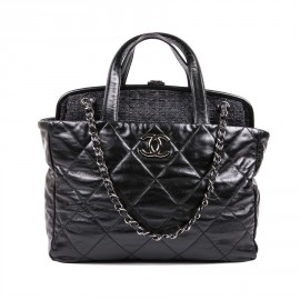 CHANEL Portobello bag in aged black quilted leather and dark gray tweed