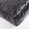 CHANEL Portobello bag in aged black quilted leather and dark gray tweed